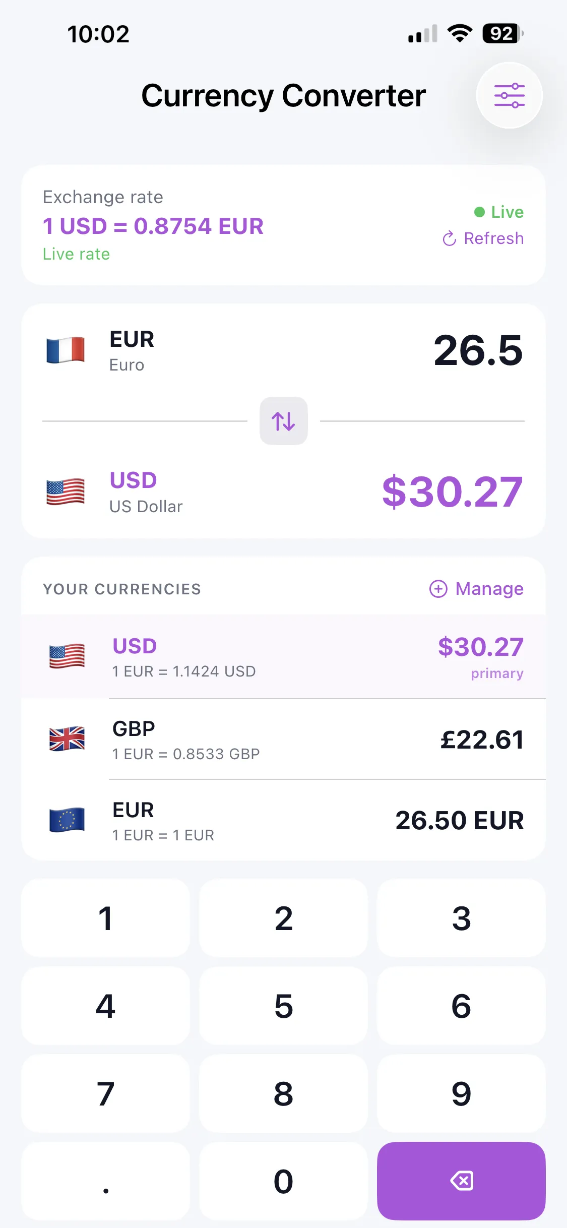 The Currency Converter in Country Survival Kit, showing a live USD to EUR rate, saved currencies and a number pad
